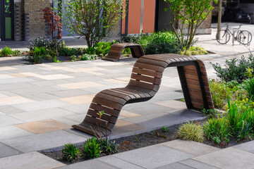 Modern Wavy Wooden Bench In Urban Space
