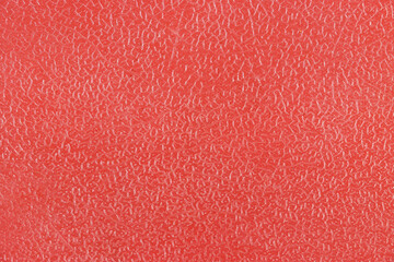 Fototapeta premium Bright red leather texture with fine detailed pattern