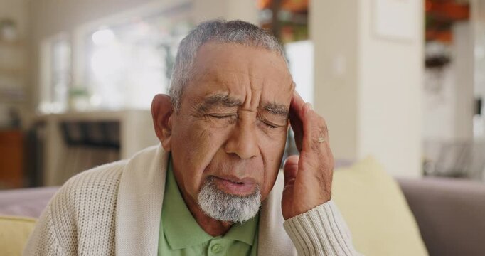Senior man, headache and pain with stress, brain fog and fatigue at nursing home, health and wellness. Retirement, pension and massage temple for migraine, elderly care for vertigo or tired in lounge