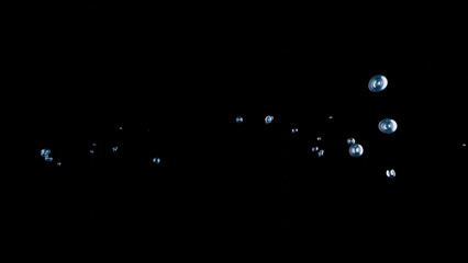 Floating water bubbles and liquid spheres create a chaotic, gurgling effect in this 3D render on a black background. The dynamic splashes evoke an underwater breathing scene, perfect for abstract