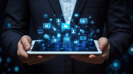 A business professional holding a tablet displaying virtual connections and people icons, representing the power of teamwork and network management