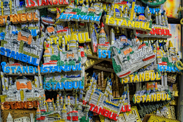 Colorful souvenir magnets with city landmarks in Grand Bazaar, Istanbul, Turkey