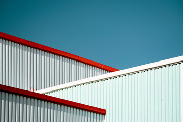 Fototapeta premium red and blue walls in the blue sky