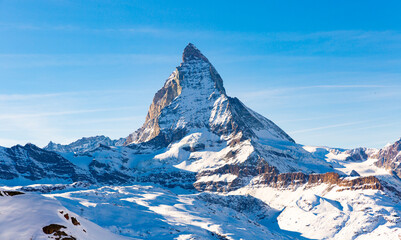 Beautiful Matterhorn mountain peak during sunny winter day in Zermatt, Switzerland