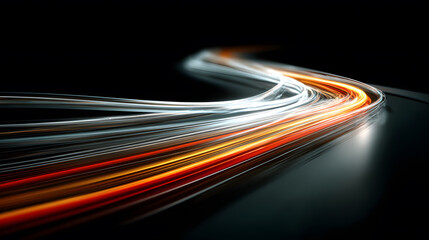 Vibrant light trails create a dynamic and abstract composition against a dark background.
