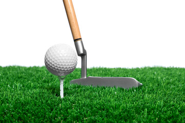 Golf ball, tee, club and green grass against white background