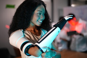 The research team is examining the robotic arm and developing new innovations. Bio-machines in the...