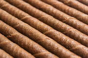 Close up of Chocolate wafer rolls texture for background