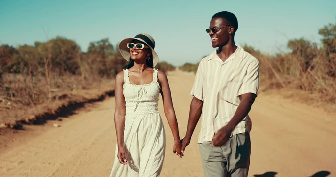 Safari, holding hands and couple with vacation for honeymoon with trust, love and connection. Happy, outdoor and man with woman for bonding in relationship on romantic weekend trip in desert.