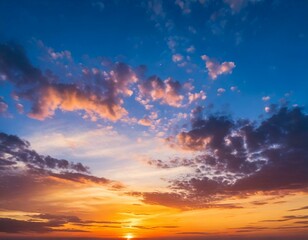 Naklejka premium Sunset Sky Background in the Evening with Dramatic Dusk Clouds and Colorful Pink, Orange Sun