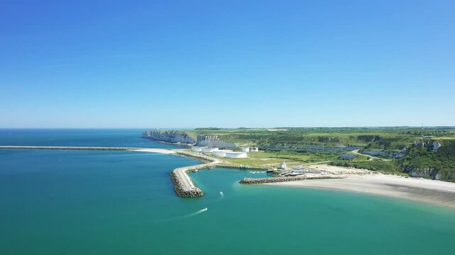 The port of Antifer nestled under the cliffs in Europe, France, Normandy, near Etretat, in summer, on a sunny day.&nbsp;