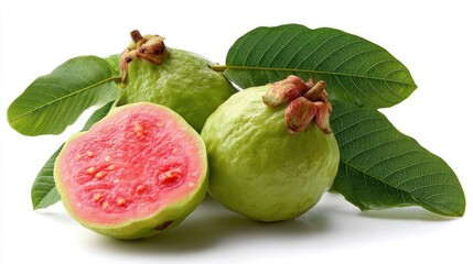 Two whole guavas and a halved guava showcasing its pink flesh, surrounded by vibrant green leaves.