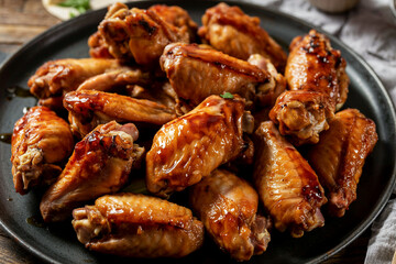 Close Up Of Delicious Looking Bbq Chicken Wings On A Plate