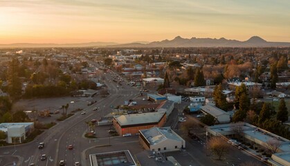 Aerial view of  Yuba City, California, USA, showcasing the city's layout with homes, businesses,...