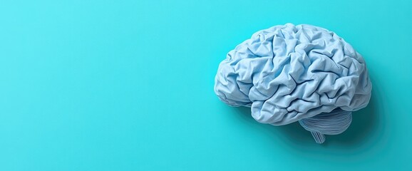 Pale blue human brain on a light teal background, viewed from the side
