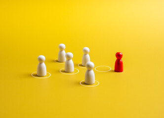 The red different one, moving out from circle, group of white peg dolls, people symbols, yellow background. Stand out from the crowd, leadership, unique, influencer, talent people, difference concept.