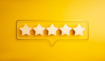 Shining gold frame, speech bubble with five wooden stars ratings inside, on yellow background. Highest level of excellence quality or satisfaction, customer evaluation, business marketing concept.