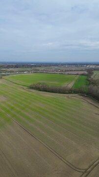 High Angle Footage of Countryside Landscape at Village of Coventry City of England United Kingdom. Aerial View Was Captured with Drone's Camera During Clear Sunny Day of March 30th, 2024