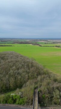 High Angle Footage of Countryside Landscape at Village of Coventry City of England United Kingdom. Aerial View Was Captured with Drone's Camera During Clear Sunny Day of March 30th, 2024