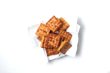 Gabin Tape, Indonesian traditional snack. Fried crackers filled with mash fermented cassava, isolated on white background