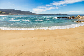 Stunning coastal landscape along California's Highway 1, featuring rugged rocky formations, and the vast blue ocean. A breathtaking natural scene showcasing the raw beauty of the Pacific coastline