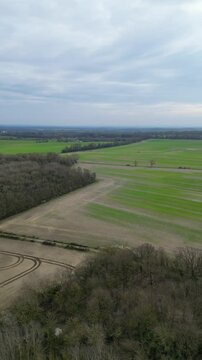 High Angle Footage of Countryside Landscape at Village of Coventry City of England United Kingdom. Aerial View Was Captured with Drone's Camera During Clear Sunny Day of March 30th, 2024