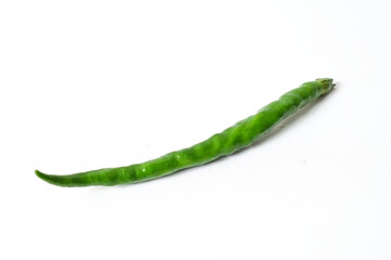 Close up view of one (1) fresh green chili pepper isolated on white background. Clipping path.