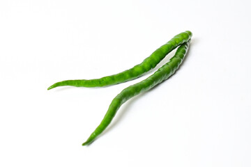 Close up view of two (2) fresh green chili peppers isolated on white background. Clipping path.