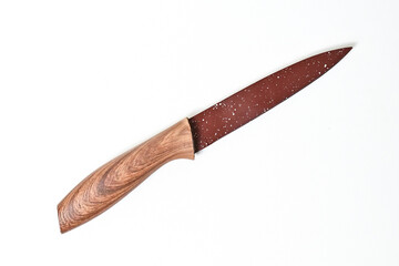 Top view of steel kitchen knife with wooden handle Isolated on white background. Convenient Kitchen...