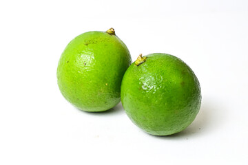 Close up view of one (1) lime fruit isolated on white background. Clipping path.