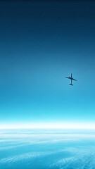 an airplane flying above the clouds
