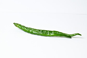Close up view of two (2) fresh green chili peppers isolated on white background. Clipping path.