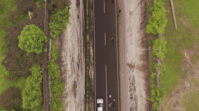 Top-Down Aerial Bird&rsquo;s-Eye View Flying Over Tanah Barak Cliff in Bali, Indonesia. Stunning Drone Footage Showcasing Dramatic Coastal Landscape and Rock Formations