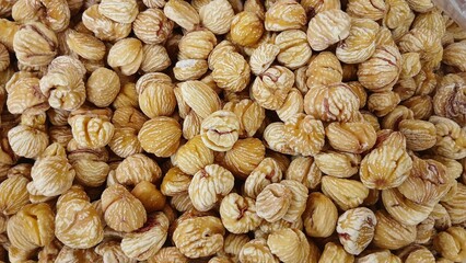 Close-up of numerous peeled and dried chestnuts