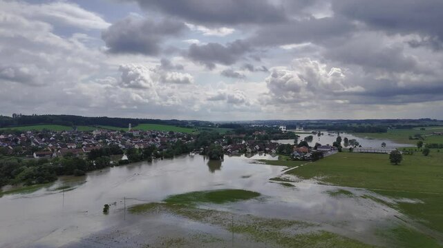 Fly towards Hohenkammer over flooded Glonn during high water 2024 in Germany, Bavaria.