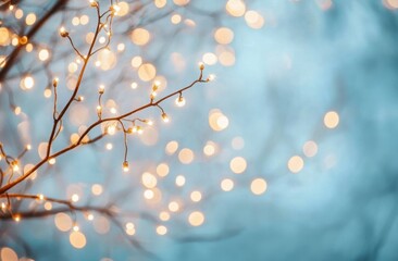 Festive winter lights on branches. Soft bokeh background