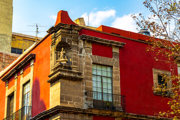 Old historical buildings house church cathedral construction in Mexico City.