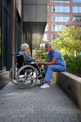 Healthcare worker listening to senior patients problems.