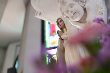 Close up of Statue of Our lady of grace virgin Mary in the church, Thailand. selective focus.
