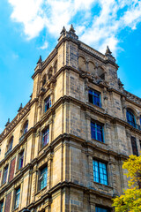 Old historical buildings house church cathedral construction in Mexico City.