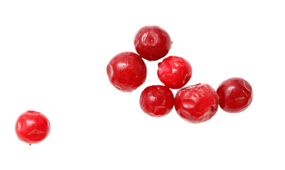 A bunch of red berries are shown in a close up