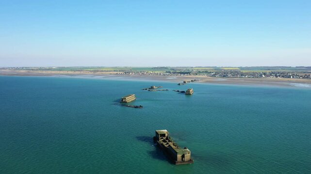Some remains of the American military port in Europe, in France, in Normandy, near Arromanches, in Asnelles, in spring, on a sunny day.&nbsp;