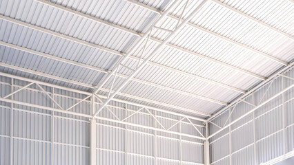 Corrugated steel roof and white metal roof beam structure with aluminium wall of industrial warehouse factory building, low angle and inside view  © Prapat