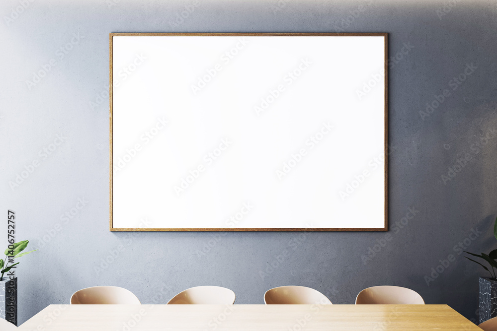 Poster modern meeting room interior with blank white canvas frame on gray wall above wooden table and chair