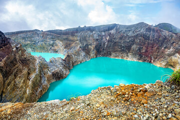 Crater lakes Danau Alapola and Kootainuamuri, Volcano Kelimutu, Island Flores, Indonesia, Southeast Asia.