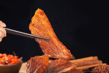 Pork crisps are placed on a wooden table