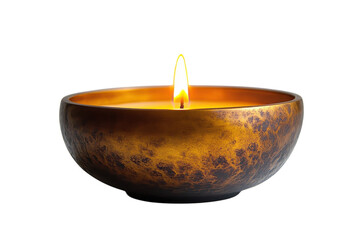 Elegant candle burning in a decorative bowl creating a warm ambiance