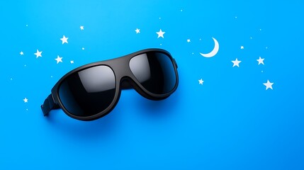 Sunglasses on blue night. Stars and moon accent the dark eyewear, a dreamy and simple scene