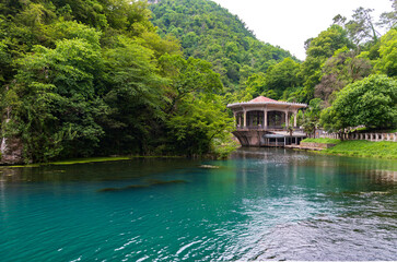 Fototapeta premium Lake in the mountains near the New Athos, Abkhazia, spring 2023