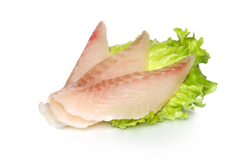 Raw fish fillet with green lettuce on a clean backdrop